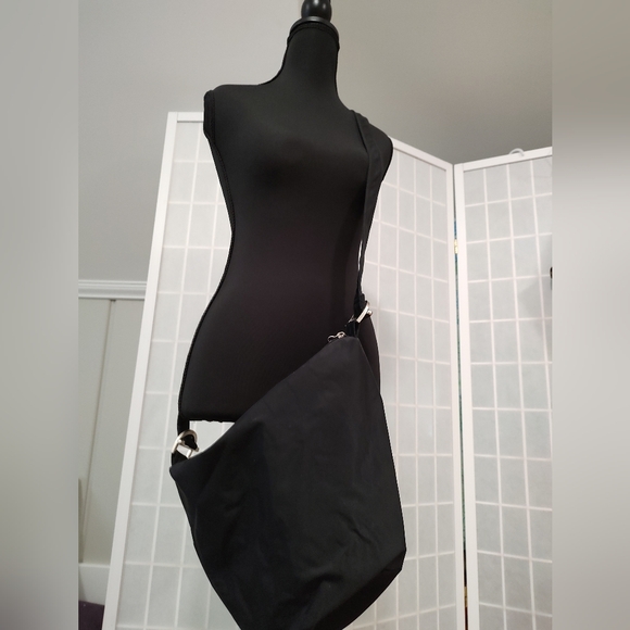 DKNY Black Crossbody Bag with Adjustable Strap and Slouchy Design - Picture 3 of 16